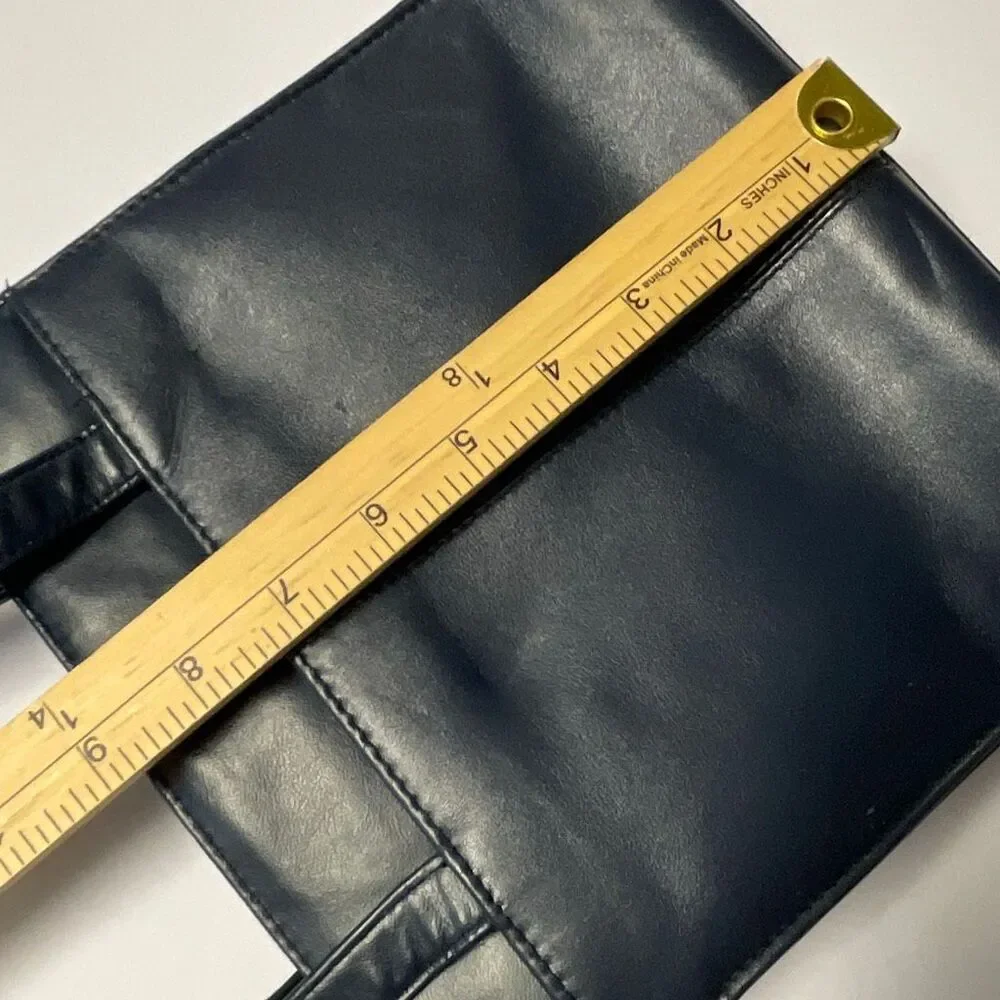 Vintage Colette blue leather shoulder bag.